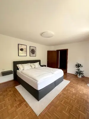 Ein Bett oder Betten in einem Zimmer der Unterkunft Privates Ferienhaus mit Pool & Whirlpool in Bad Dürkheim