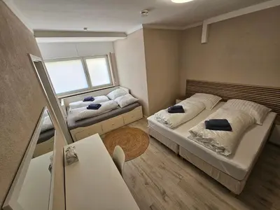 Ein Bett oder Betten in einem Zimmer der Unterkunft Rheinhessenglück