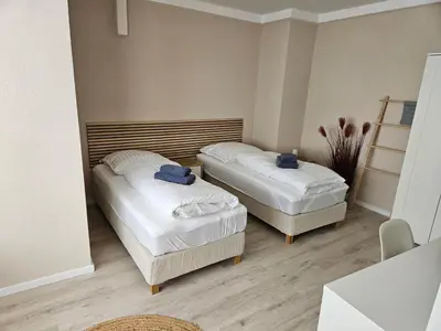 Ein Bett oder Betten in einem Zimmer der Unterkunft Rheinhessenglück