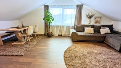 Ein Sitzbereich in der Unterkunft Blackforest Apartment Schömberg