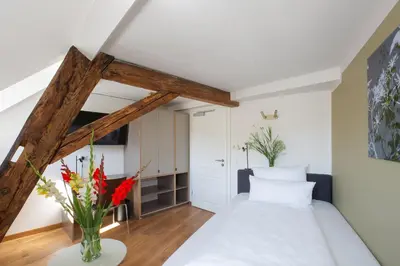 Ein Bett oder Betten in einem Zimmer der Unterkunft Hotel Kredell