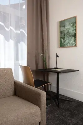 Ein Sitzbereich in der Unterkunft Hotel Kredell
