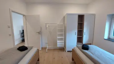 Ein Bett oder Betten in einem Zimmer der Unterkunft Ferienwohnung Zur Hofreite 6