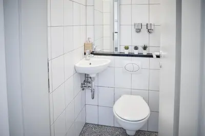 Ein Badezimmer in der Unterkunft NIRO I Design Penthouse Apartment, Elegant, Gemütlich, Dachterrasse, TV