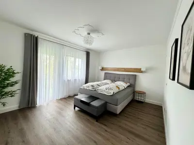 Ein Bett oder Betten in einem Zimmer der Unterkunft 220 qm Penthouse Wohnung mit Fahrstuhl - ohne SPA