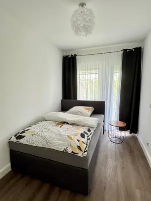 Ein Bett oder Betten in einem Zimmer der Unterkunft 220 qm Penthouse Wohnung mit Fahrstuhl - ohne SPA