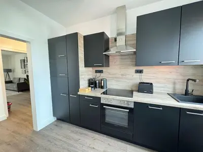 Küche/Küchenzeile in der Unterkunft 220 qm Penthouse Wohnung mit Fahrstuhl - ohne SPA