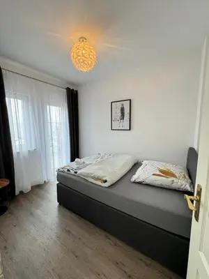 Ein Bett oder Betten in einem Zimmer der Unterkunft 220 qm Penthouse Wohnung mit Fahrstuhl - ohne SPA