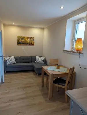 Ein Sitzbereich in der Unterkunft Ferienwohnungen Schallenberg Fewo Nr 6