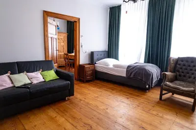 Ein Bett oder Betten in einem Zimmer der Unterkunft Obere Stadtwohnung