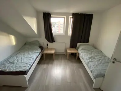 Ein Bett oder Betten in einem Zimmer der Unterkunft Monteur- und Arbeiterunterkunft Ludwigshafen