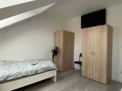 Ein Bett oder Betten in einem Zimmer der Unterkunft Monteur- und Arbeiterunterkunft Ludwigshafen