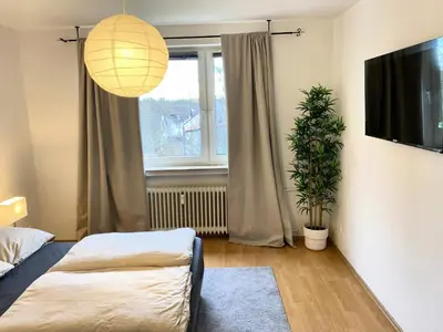 Ein Bett oder Betten in einem Zimmer der Unterkunft Perfekt für 1, 2 und bis zu 6 Personen - Nah am Flughafen, Frankfurt City, Wiesbaden und Rüsselsheim