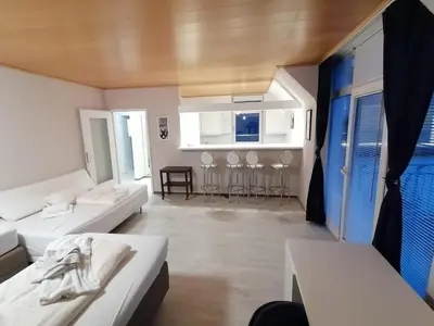 Ein Sitzbereich in der Unterkunft 1 Zimmer Apartment