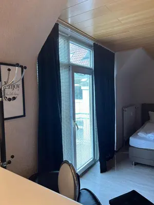 Ein Bett oder Betten in einem Zimmer der Unterkunft 1 Zimmer Apartment