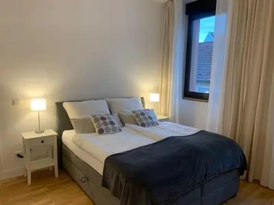 Ein Bett oder Betten in einem Zimmer der Unterkunft Charmante Altbauwohnung