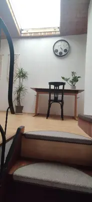 Ein Sitzbereich in der Unterkunft Vieja Casita de huespedes con Escaleras