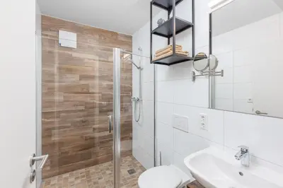 Ein Badezimmer in der Unterkunft Maxim Apartments