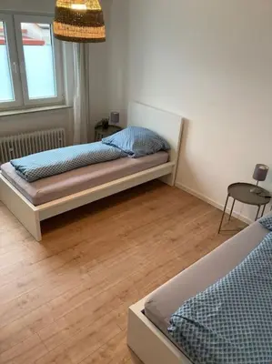Ein Bett oder Betten in einem Zimmer der Unterkunft 3 Zimmer Küche Bad - Monteurwohnung in ruhiger Lage
