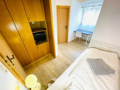 Ein Bett oder Betten in einem Zimmer der Unterkunft Pension Spatzennest