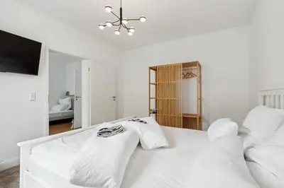 Ein Bett oder Betten in einem Zimmer der Unterkunft modern living - BASF - MA - PFALZ - 1 Gym 2 Working Spaces