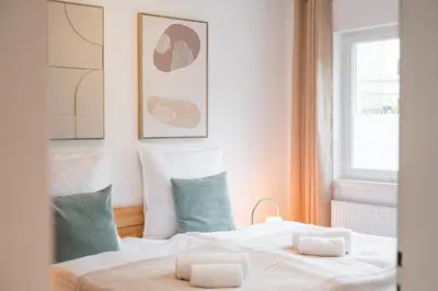 Ein Bett oder Betten in einem Zimmer der Unterkunft Zentrale Lage, zwei Schlafzimmer, Waschmaschine