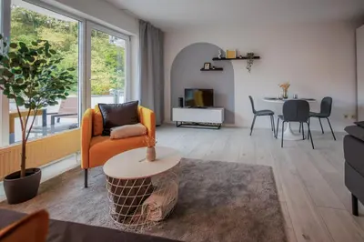 Ein Sitzbereich in der Unterkunft Stylishes Village Apartment