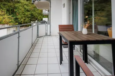 Ein Balkon oder eine Terrasse in der Unterkunft Stylishes Village Apartment