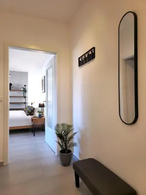 Ein Bett oder Betten in einem Zimmer der Unterkunft MAWULO Studio Neustadt Zentrum
