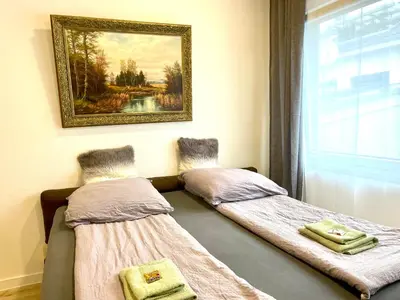 Ein Bett oder Betten in einem Zimmer der Unterkunft Goldstadt Classic Suite - City Apartament am Schlössle