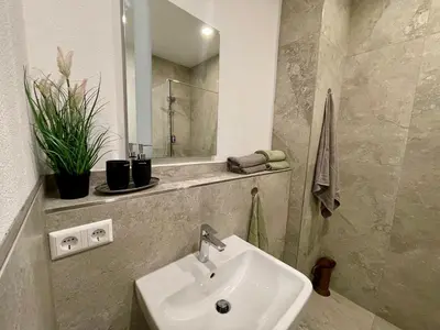 Ein Badezimmer in der Unterkunft Goldstadt Classic Suite - City Apartament am Schlössle