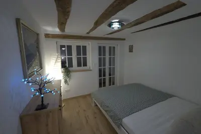 Ein Bett oder Betten in einem Zimmer der Unterkunft Moderner Altstadt-Diamant