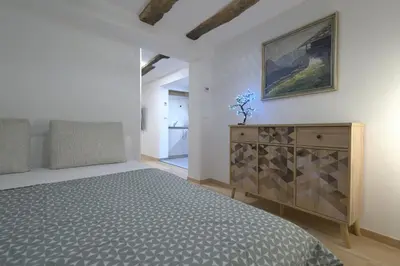 Ein Bett oder Betten in einem Zimmer der Unterkunft Moderner Altstadt-Diamant
