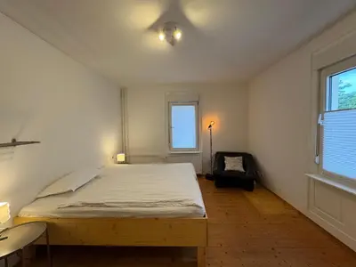 Ein Bett oder Betten in einem Zimmer der Unterkunft 90qm 4-Zimmer-Wohnung - Apartment Friedrichstraße