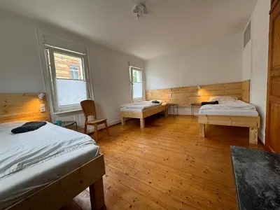 Ein Bett oder Betten in einem Zimmer der Unterkunft 90qm 4-Zimmer-Wohnung - Apartment Friedrichstraße