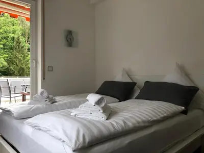 Ein Bett oder Betten in einem Zimmer der Unterkunft Residenz Waldblick 5 STERNE Penthouse-Ferienwohnung Klassifizierung DTV