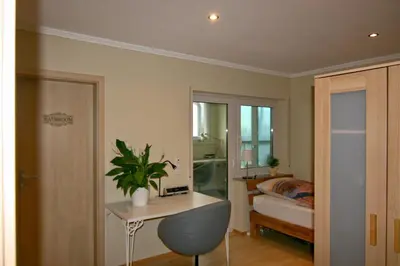 Ein Bett oder Betten in einem Zimmer der Unterkunft Haus Pleidelsheim