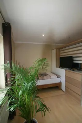 Ein Bett oder Betten in einem Zimmer der Unterkunft Haus Pleidelsheim