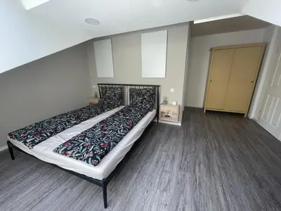 Ein Bett oder Betten in einem Zimmer der Unterkunft Smart Apartment Heidelberg