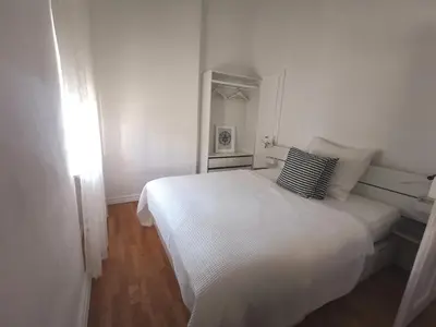 Ein Bett oder Betten in einem Zimmer der Unterkunft Helle Stadtwohnung Miltenberg Perle am Main