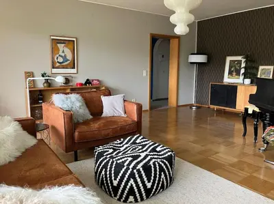Ein Sitzbereich in der Unterkunft Großzügige Wohnung mit Flair und Aussicht