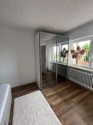 Ein Bett oder Betten in einem Zimmer der Unterkunft Ferienwohnung Firmenwohnung Nähe Maulbronn Badesee
