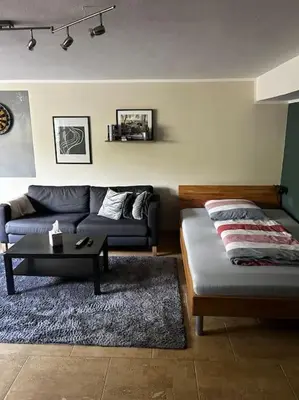 Ein Bett oder Betten in einem Zimmer der Unterkunft Ruhige Wohnung am Ortsrand - nahe KIT-Campus Nord