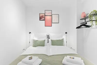 Ein Bett oder Betten in einem Zimmer der Unterkunft APPARTIO - Altstadt-Appartements I Zentral I Küche I Business