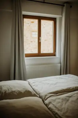 Ein Bett oder Betten in einem Zimmer der Unterkunft Modern Boho-Style Apartment