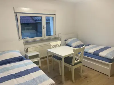 Ein Bett oder Betten in einem Zimmer der Unterkunft Easy Living Neckarsulm Zentrum