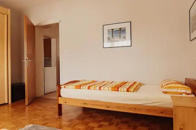 Ein Bett oder Betten in einem Zimmer der Unterkunft Privates Apartment im Grünen