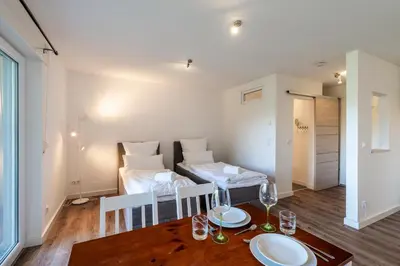 Ein Bett oder Betten in einem Zimmer der Unterkunft 1-Zimmerapartment Am Hochwald