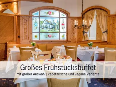 Ein Restaurant oder anderes Speiselokal in der Unterkunft Haus Maximilian by Hotel Lamm