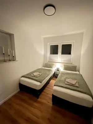 Ein Bett oder Betten in einem Zimmer der Unterkunft Ferienwohnung am Felsenmeer